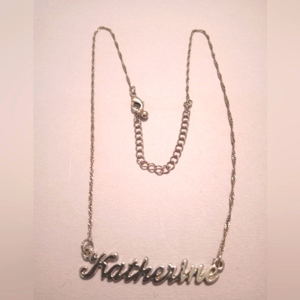 #164.   Silver Toned Katherine Nameplate Necklace. 10" Long